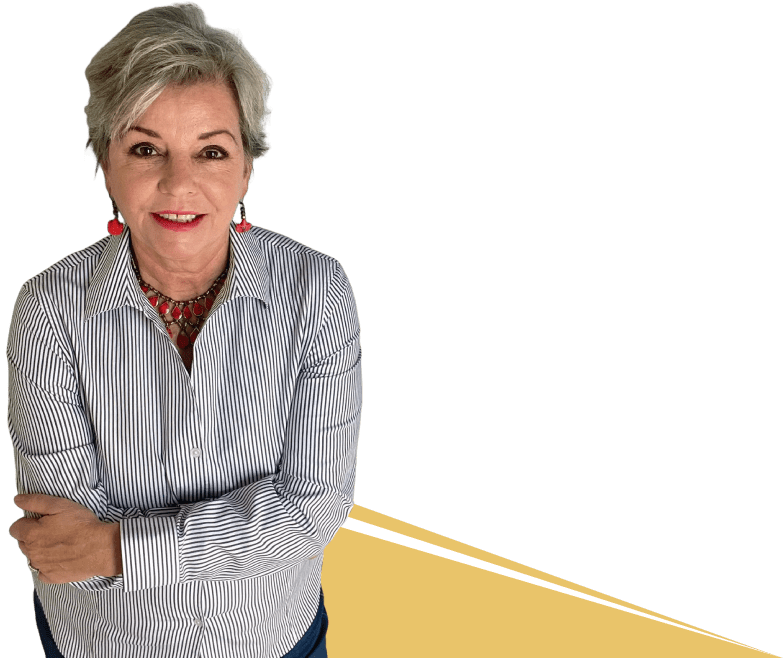 Smiling woman with crossed arms against a simple background.